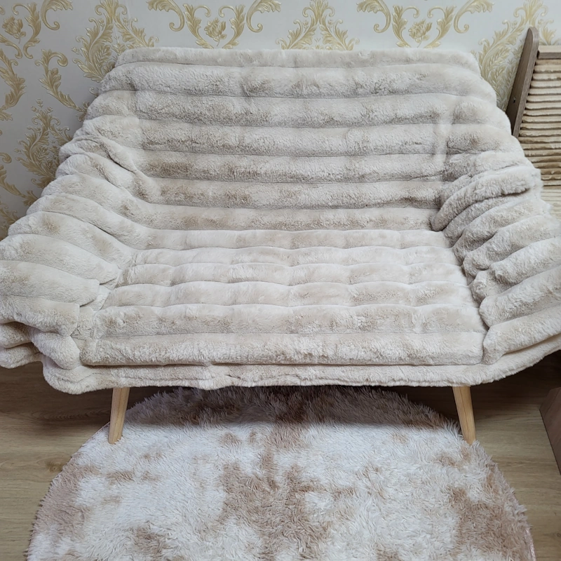 little sofa for sitting next to dinning table in living room.